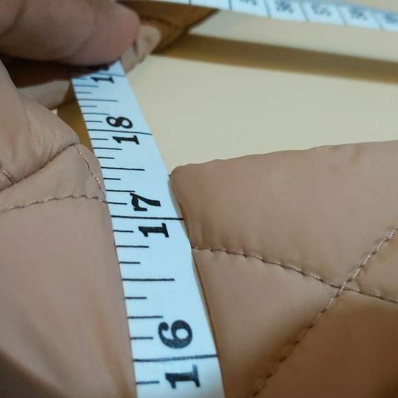 Sela| Tan Unisex Onesie Snowsuit buttoned and zippered with zippered pockets - Picture 13 of 13
